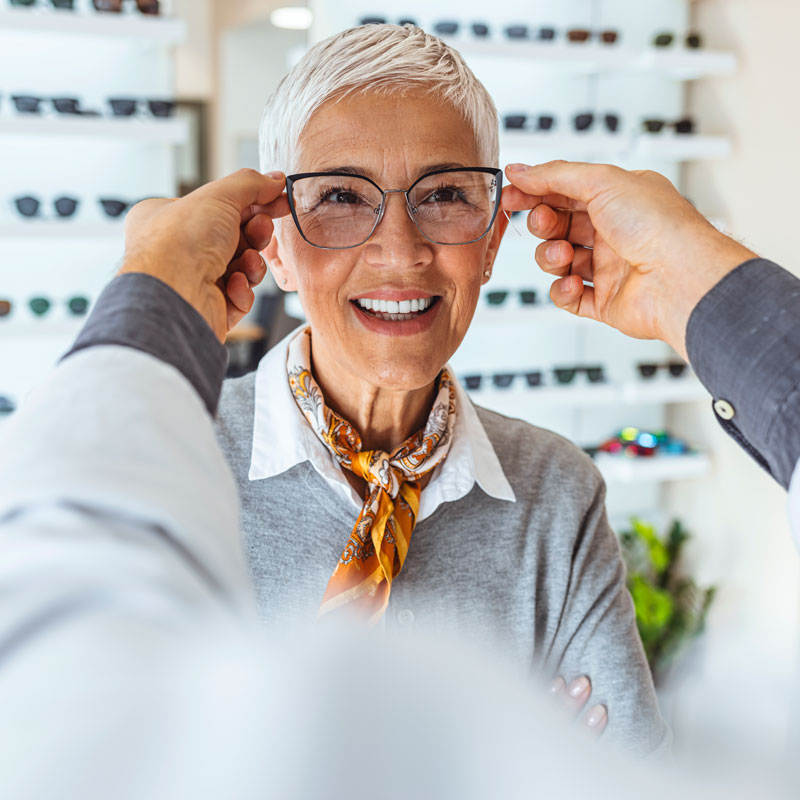 lady trying on glasses